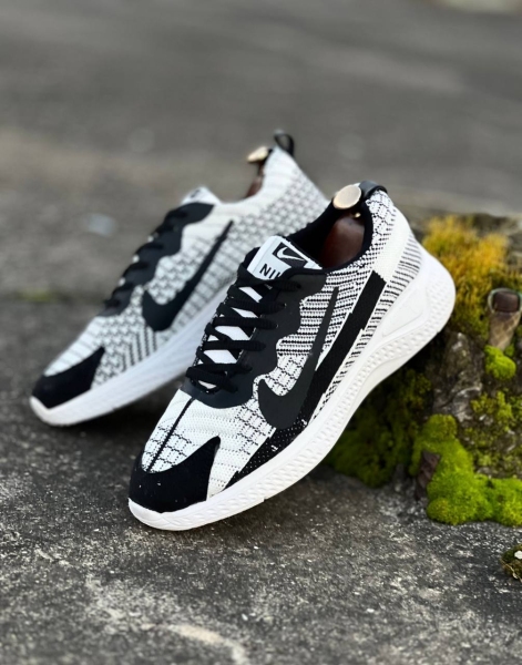 کتونی حراجی NIKE بافتی طوسی مشکی سفید
